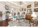 Elegant living room with ample seating, stylish decor, and abundant natural light at 3441 Club Ridge Ct, Gastonia, NC 28056