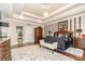 Spacious main bedroom features elegant furnishings, tray ceilings, and dark hardwood floors at 3441 Club Ridge Ct, Gastonia, NC 28056