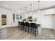 Bright, modern kitchen featuring an island with seating and ample cabinet space at 36140 Greg Norman Dr # 1003, Lancaster, SC 29720