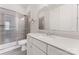Modern bathroom features a gray tile shower, white vanity, and quartz countertop at 4008 Pinot Way, Fort Mill, SC 29707