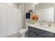 Clean bathroom featuring white shower curtain, toilet, and vanity with sink at 4008 Pinot Way, Fort Mill, SC 29707