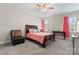 Comfortable bedroom with a ceiling fan, carpet, and windows offering natural light at 4008 Pinot Way, Fort Mill, SC 29707