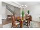 Formal dining room with hardwood floors, chandelier, and elegant wainscoting at 4008 Pinot Way, Fort Mill, SC 29707
