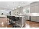 Gourmet eat-in kitchen features granite countertops, stainless appliances, and an island with seating at 4008 Pinot Way, Fort Mill, SC 29707