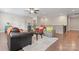 Cozy living room featuring hardwood floors, neutral walls, and comfortable seating with great natural light at 4008 Pinot Way, Fort Mill, SC 29707