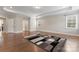 Large living room featuring hardwood floors, tray ceiling, and lots of space at 4008 Pinot Way, Fort Mill, SC 29707