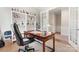 Well-appointed home office with built-in bookshelves and a classic wooden desk at 4008 Pinot Way, Fort Mill, SC 29707