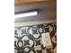 Intricate gray and white patterned tile backsplash creating a stylish design element in the kitchen at 415 S Central Ave, Locust, NC 28097