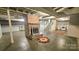 A spacious basement with a fireplace at 415 S Central Ave, Locust, NC 28097
