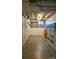 View of a basement with exposed rafters and open space at 415 S Central Ave, Locust, NC 28097