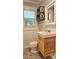 Cozy bathroom featuring white bead-board walls, rustic sink and vintage-industrial decor at 415 S Central Ave, Locust, NC 28097
