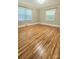 Cozy bedroom with hardwood floors and bright windows at 415 S Central Ave, Locust, NC 28097