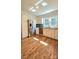 Bright kitchen features stainless appliances, granite countertops, and ample cabinet space at 415 S Central Ave, Locust, NC 28097