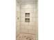 Tiled shower featuring a built-in niche at 415 S Central Ave, Locust, NC 28097