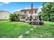 Expansive backyard features a wooden deck with gazebo, mature trees, and lush green lawn at 488 Saint George Rd, Fort Mill, SC 29708
