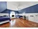 Spacious bedroom featuring two beds, wood floors, and a comfortable layout at 488 Saint George Rd, Fort Mill, SC 29708
