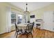 Charming dining area features natural light, hardwood floors, and space for Gathering meals at 488 Saint George Rd, Fort Mill, SC 29708