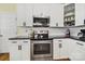 Updated kitchen featuring stainless steel appliances, sleek countertops, and ample cabinet space at 488 Saint George Rd, Fort Mill, SC 29708