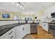 Well-designed kitchen showcases stainless steel appliances, open layout, and adjacent dining area at 488 Saint George Rd, Fort Mill, SC 29708