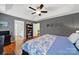 Comfortable main bedroom featuring hardwood floors, neutral decor, and ensuite access at 488 Saint George Rd, Fort Mill, SC 29708