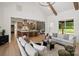 Open-concept living room flows into the kitchen and dining area, perfect for entertaining and Gathering gatherings at 5015 Lancaster Hwy, Monroe, NC 28112