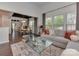 Inviting living room with an open layout flowing into the dining area at 5020 Forest Hills Pl, Fort Mill, SC 29707