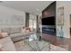 Modern living room featuring a fireplace and open floor plan, perfect for gatherings at 5020 Forest Hills Pl, Fort Mill, SC 29707