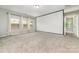 Spacious bonus room with plush carpeting, ample natural light, and an open doorway at 5098 Burnwald Ct, Fort Mill, SC 29715