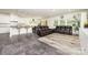 Open-concept living area featuring sleek gray floors, a breakfast bar, and comfortable seating, great for modern living at 5098 Burnwald Ct, Fort Mill, SC 29715
