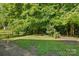 Lush backyard with plenty of greenery and a privacy fence at 611 Annalinde Ln, Rock Hill, SC 29732