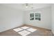 Bright bedroom with a ceiling fan and a window offering neighborhood views at 611 Annalinde Ln, Rock Hill, SC 29732