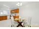 Bright dining space adjacent to the kitchen, featuring a modern table setting for enjoying meals with Gathering and friends at 611 Annalinde Ln, Rock Hill, SC 29732