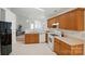 Well-lit kitchen featuring wood cabinetry and modern appliances, offering an efficient cooking space for home chefs at 611 Annalinde Ln, Rock Hill, SC 29732