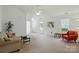 Airy living room featuring abundant natural light, a comfortable seating area, and a ceiling fan for optimal comfort at 611 Annalinde Ln, Rock Hill, SC 29732