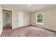 Bedroom featuring pink carpet, natural light, and neutral wall colors at 828 Carver St # 17-19, Shelby, NC 28152
