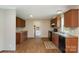 Well-equipped kitchen featuring warm wood cabinets, modern appliances, and a practical layout for cooking at 828 Carver St # 17-19, Shelby, NC 28152