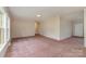 This spacious living room has a window view and neutral wall colors at 828 Carver St # 17-19, Shelby, NC 28152