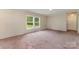 Spacious living room with two windows offering a bright and airy feel at 828 Carver St # 17-19, Shelby, NC 28152