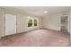 Inviting living room with a bright window that provides natural light and street view at 828 Carver St # 17-19, Shelby, NC 28152