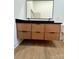 A bathroom featuring a double vanity sink with drawers and a minimalist design at 908 Apex Dr, Albemarle, NC 28001