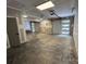 Spacious garage offers multiple bays and convenient access to interior space at 908 Apex Dr, Albemarle, NC 28001