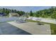 Concrete patio with outdoor furniture and a white fence surrounding the backyard at 9226 Dunwich Dr, Gastonia, NC 28056