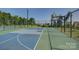 A well-maintained community basketball court with professional striping and new backboards is ready for a pickup game at 9226 Dunwich Dr, Gastonia, NC 28056