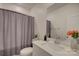 Bathroom featuring a single sink, vanity, mirror, and shower with curtain at 9226 Dunwich Dr, Gastonia, NC 28056