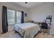 Bedroom with a work space, window, carpeted floor, and Queen size bed at 9226 Dunwich Dr, Gastonia, NC 28056