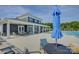 Community pool area featuring lounge chairs and a covered seating area at 9226 Dunwich Dr, Gastonia, NC 28056