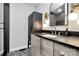 Modern bathroom featuring sleek vanity, stylish fixtures, and elegant black and white tile at 9423 Man O War Rd, Fort Mill, SC 29707
