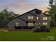 Stunning two-story home featuring a stone facade, well-maintained lawn, and inviting entryway at 9423 Man O War Rd, Fort Mill, SC 29707
