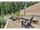 Cozy backyard fire pit area with comfortable seating, gravel bed, and privacy fencing, perfect for entertaining at 9423 Man O War Rd, Fort Mill, SC 29707
