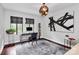 Bright home office with natural light, hardwood floors, and stylish accents at 9423 Man O War Rd, Fort Mill, SC 29707